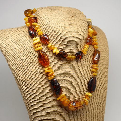 alt="Collar largo de ambar  con cordon en varios tonos. www.santelmotienda.com"