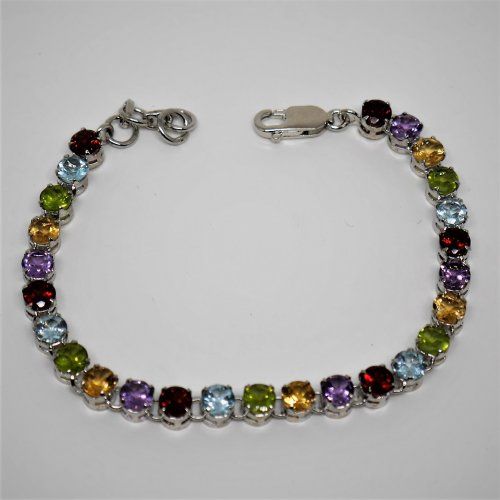 alt="Pulsera de Plata de ley Rodinada con amatistas, topacios, granates, olivinas, topacio .www.santelmotienda.com. jpg"