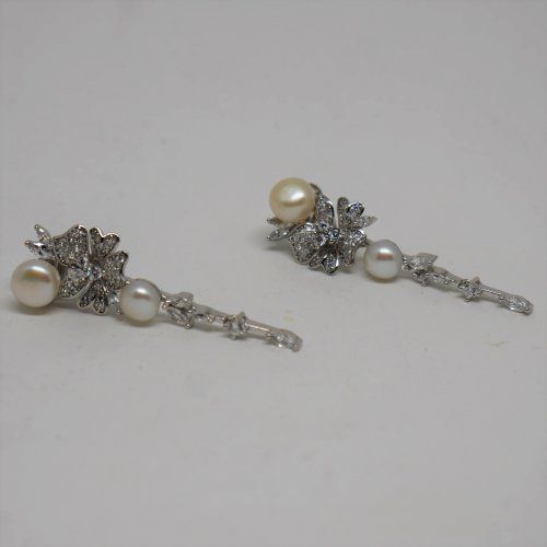 alt="Pendientes largos de Plata de ley Rodinada 925 Mils. con  perlas cultivadas. www.santelmotienda.com"