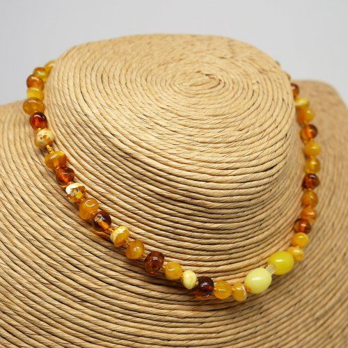 alt="Collar de ambar para bebe en varios tonos. www.santelmotienda.com"