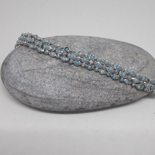 Pulsera de Plata de ley , 925 MIls. con baño de rodio y turquesas