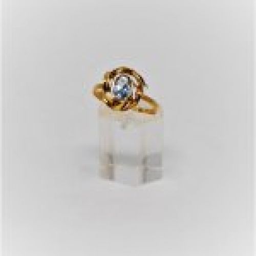 alt:"anillo oro de ley 18 k. con topacio azul. www.santelmotienda.com"