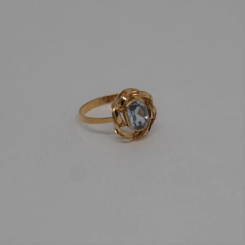 alt:"anillo oro de ley 18 k. con topacio azul. www.santelmotienda.com"