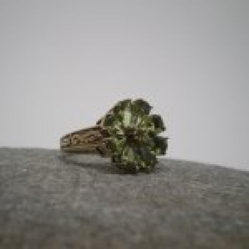 alt=\"Sortija oro olivinas flor\"