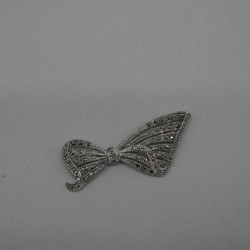 alt=\"broche plata ley marcasitas nora musical\"