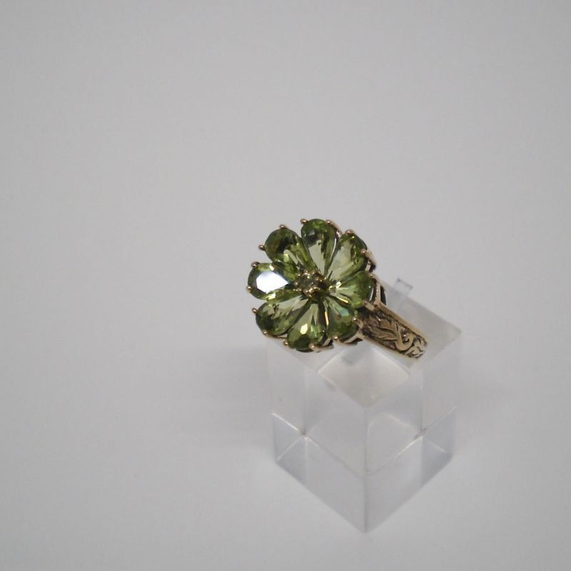 alt=\"Sortija oro olivinas flor\"