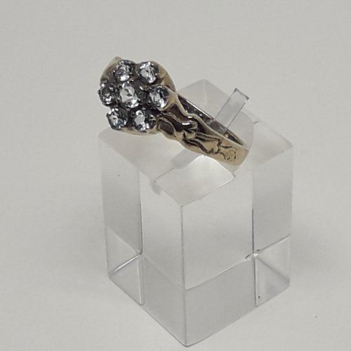 alt=\"Sortija de oro bajo 9 K. y roseta de 7 amatistas\"