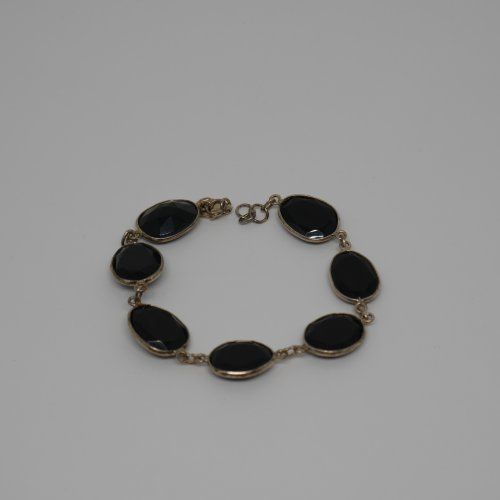 Pulsera de Plata de ley 925 Mils. con 7 Onix