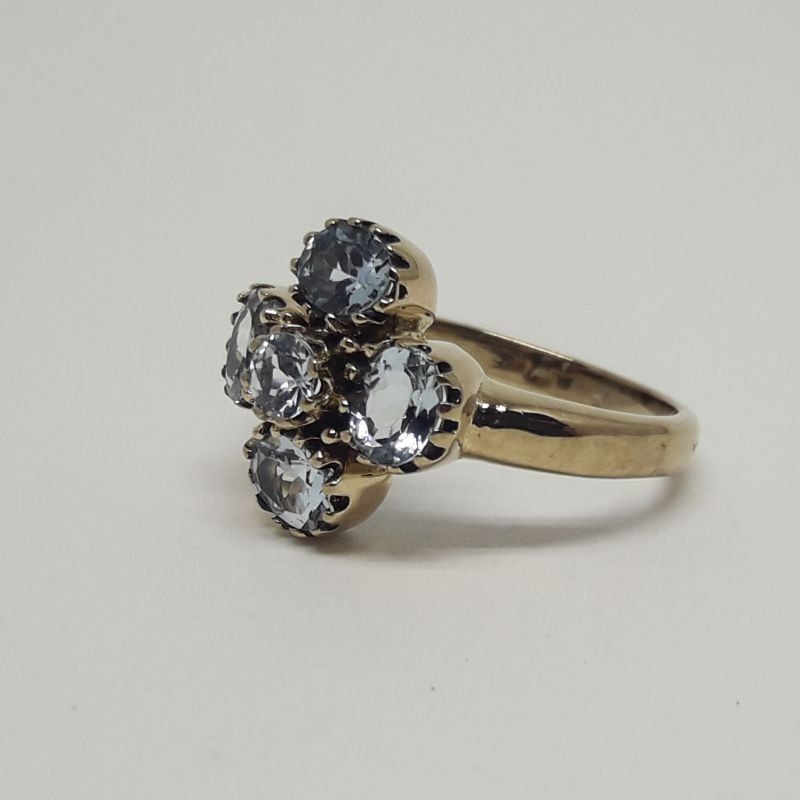 alt=\"Sortija de oro bajo 9 K. con 5 topacios azules\"