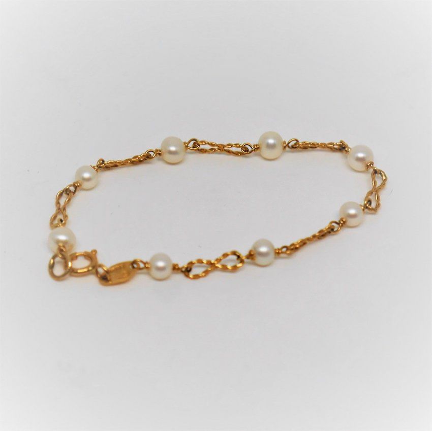 alt=\"Pulsera de niña de Oro de Ley 18 K. con Perlas cultivadas www.santelmotienda.com\"
