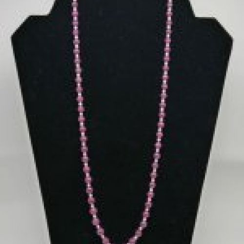 alt="Collar de Rubies y Perlas cultivadas con cierre de Oro de ley 18 K."