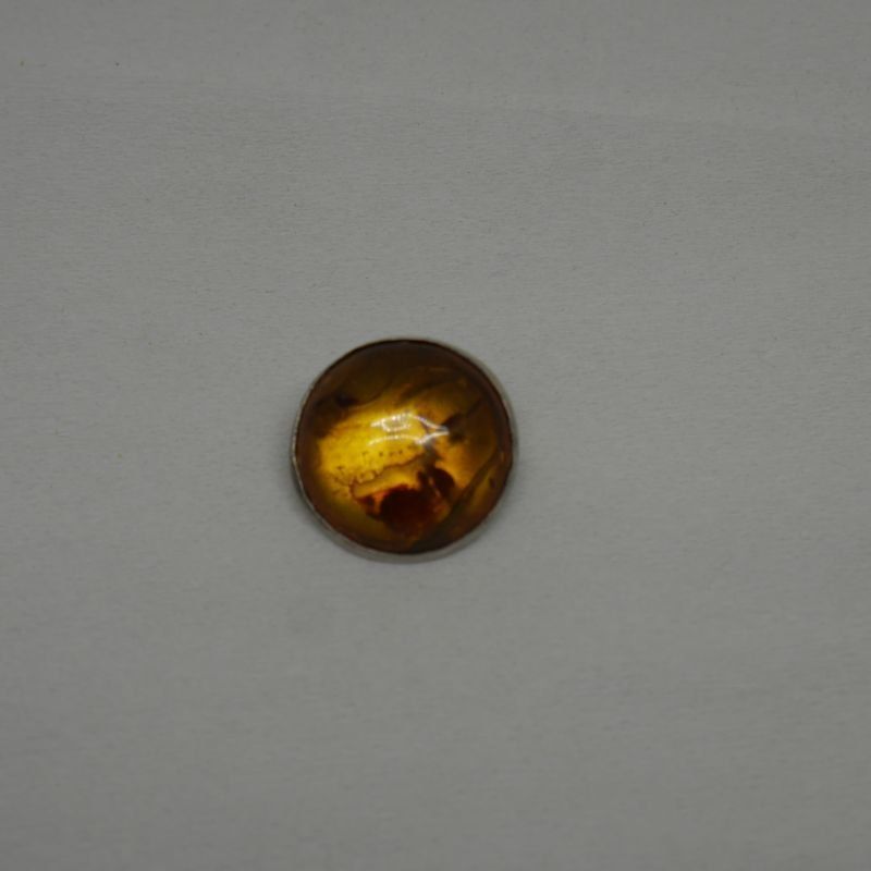 alt="broche de plata de ley y ambar redondo"