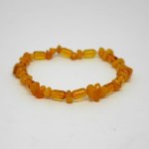 alt=\"pulsera de ambar elastica tonos amarillos. www.santelmotienda.com\"