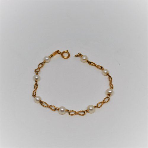 alt=\"Pulsera de niña de Oro de Ley 18 K. con Perlas cultivadas www.santelmotienda.com\"