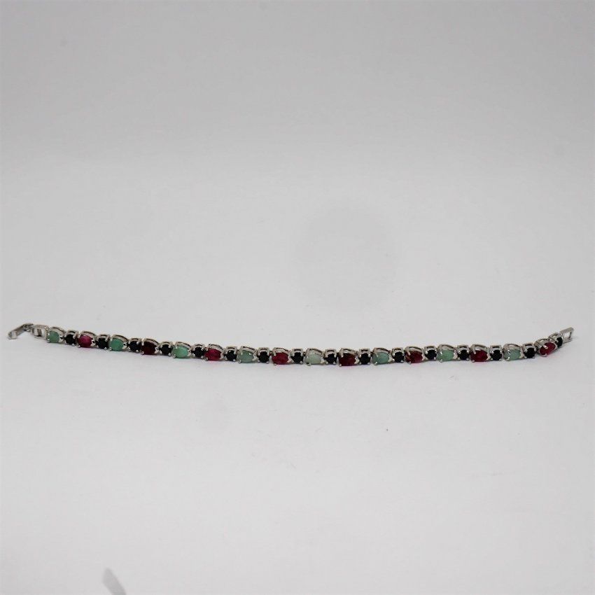 alt=\"pulsera de plata de ley rodinada 925 Mils. con rubies, zafiros y esmeraldas. www.santelmotienda.com\"