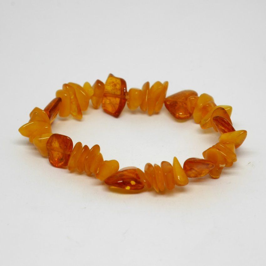 alt="pulsera de ambar elastica en tonos anaranjados y amarillos
