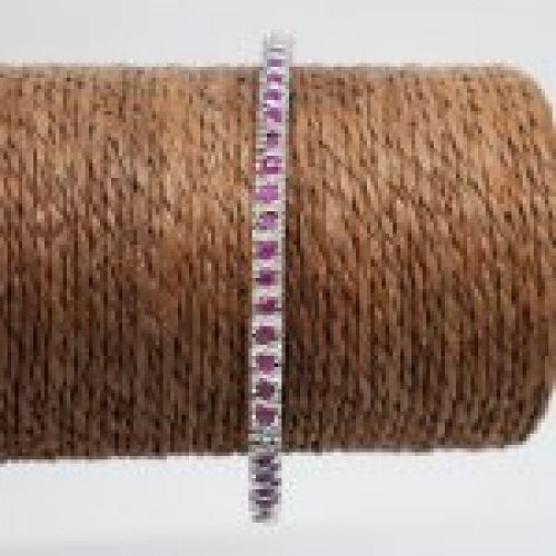 alt=\"pulsera de plata rodinada y rubies. www.santelmotienda.com\"