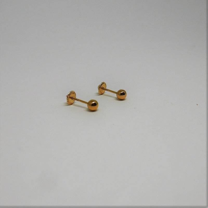 alt=\"pendientes niña oro de ley 18 K. bola lisa\"