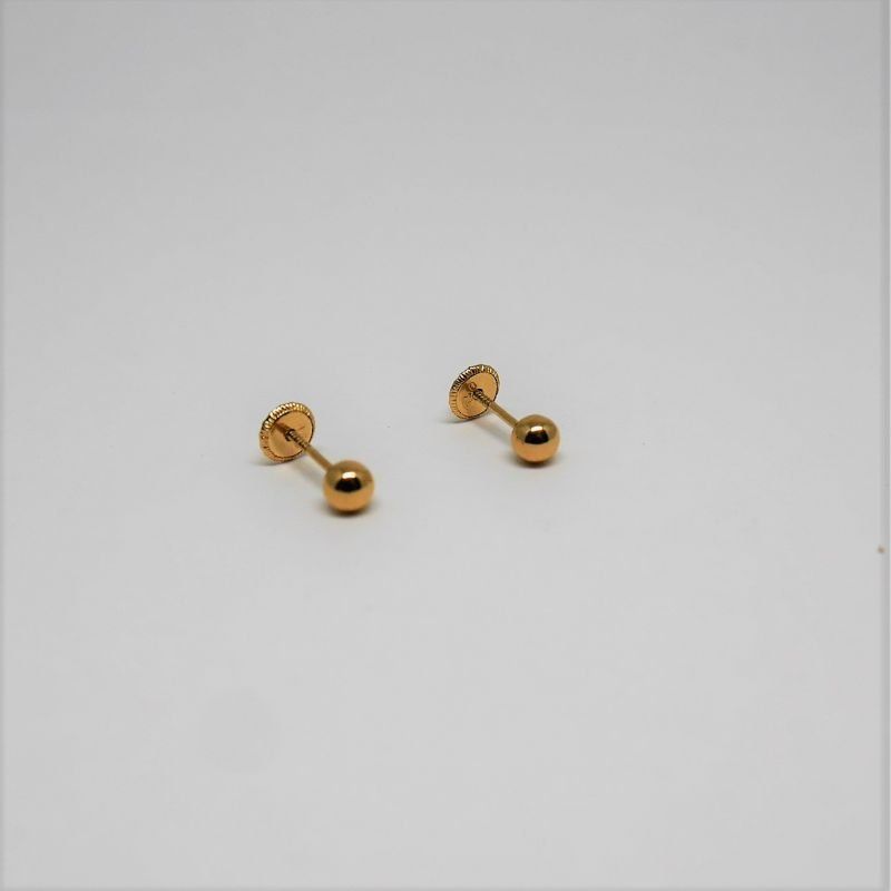 alt=\"pendientes niña oro de ley 18 K. bola lisa\"