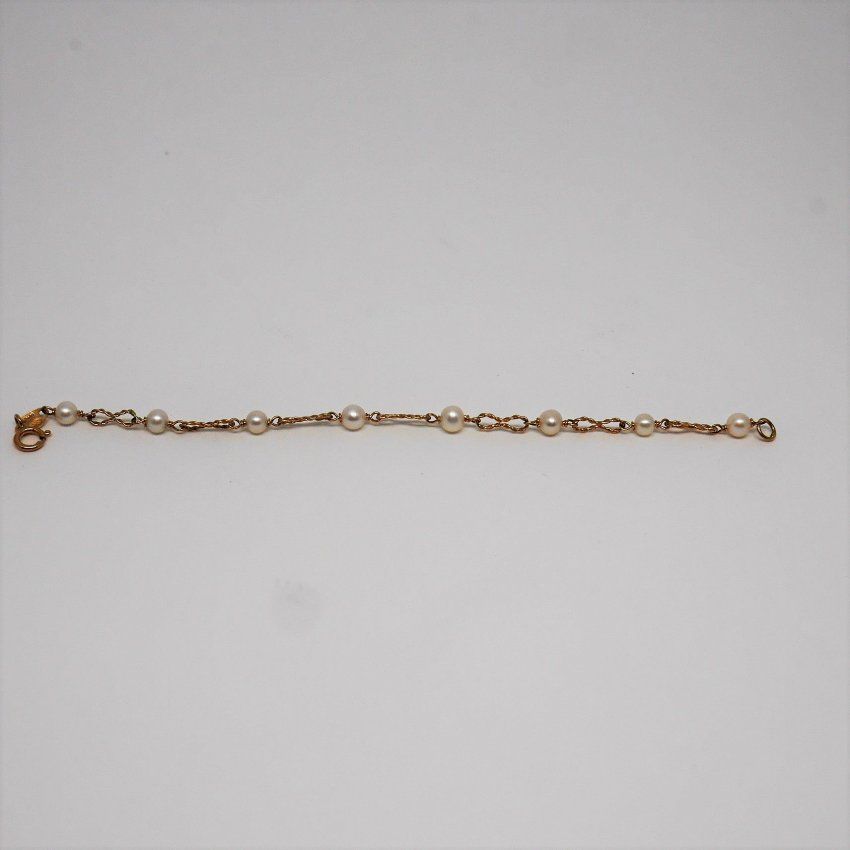 alt=\"Pulsera de niña de Oro de Ley 18 K. con Perlas cultivadas www.santelmotienda.com\"