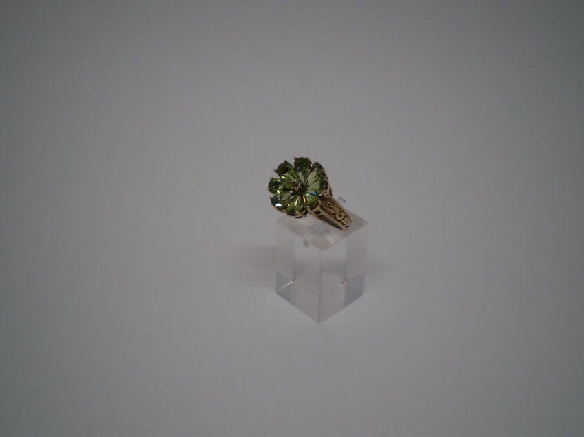 alt=\"Sortija oro olivinas flor\"