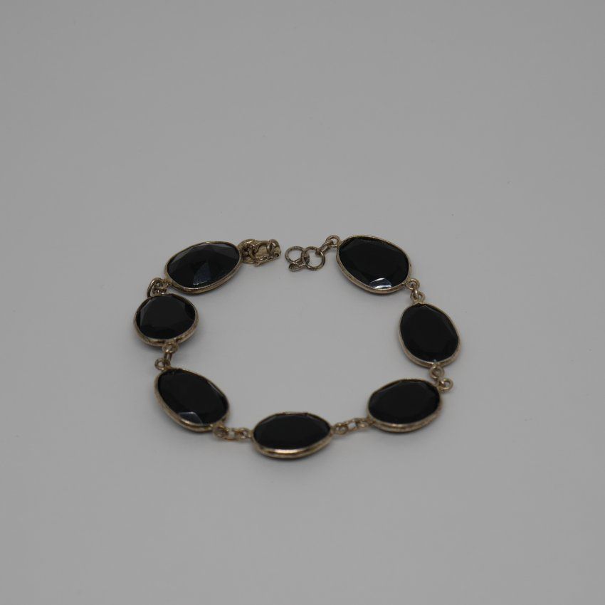 Pulsera de Plata de ley 925 Mils. con 7 Onix