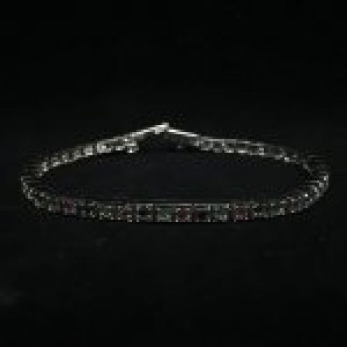 Pulsera de Plata de Ley con baño de rodio y sin fin de rubies, zafiros y esmeraldas