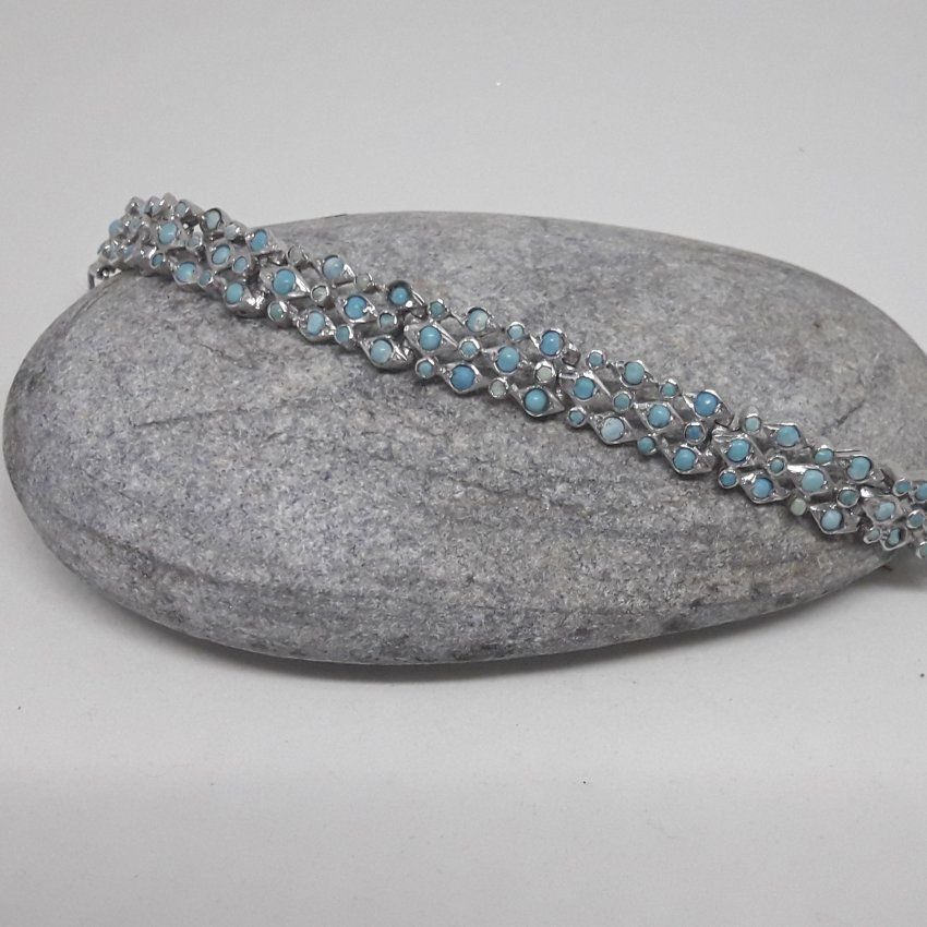 Pulsera de Plata de ley , 925 MIls. con baño de rodio y turquesas