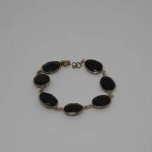 Pulsera de Plata de ley 925 Mils. con 7 Onix