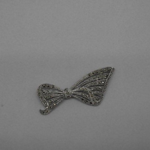 alt=\"broche plata ley marcasitas nora musical\"