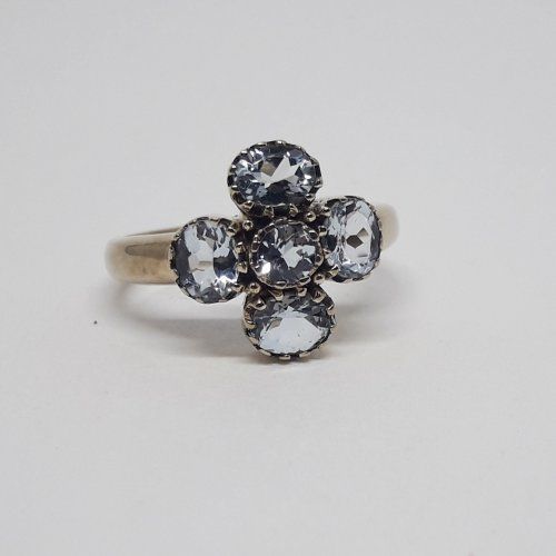 alt=\"Sortija de oro bajo 9 K. con 5 topacios azules\"