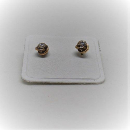 alt=\"pendientes niña de oro de ley 18 K. con circonitas en forma de nudo\"