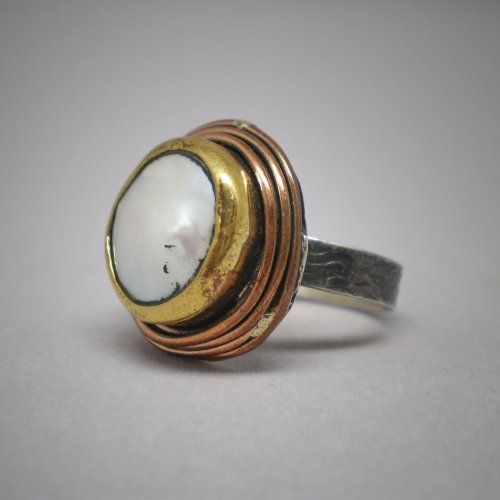 Sortija de plata y plata dorada de ley 925 Mils. con perla natural