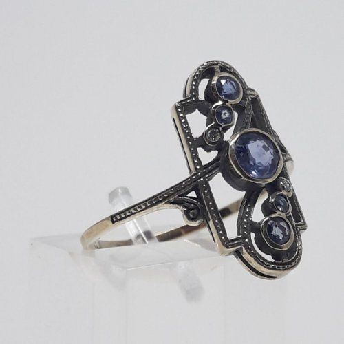 alt=\"Sortija de oro bajo 9 K. con 3 topacios azules\"