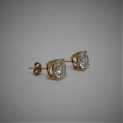 alt=\"pendientes garras oro niña mujer con circonita\"