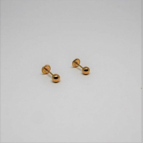 alt=\"pendientes niña oro de ley 18 K. bola lisa\"