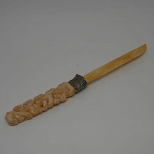 Abrecartas de hueso tallado a mano con relieve de 2 monos
