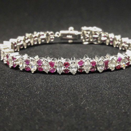 Pulsera de Plata de ley con baño de rodio, cristal de roca y rubies