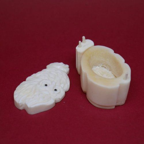 Caja de hueso con dibujo de dos buho