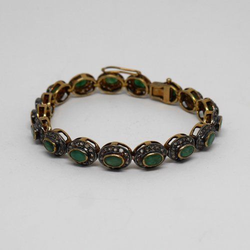 alt:\"pulsera plata de ley con baño de oro, diamantes y esmeraldas. www.santelmotienda.com\"