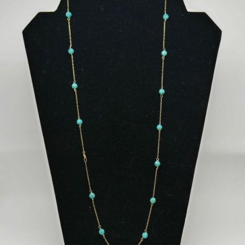 alt=\"Collar de Oro de ley 18 K. con Turquesas facetadas\"