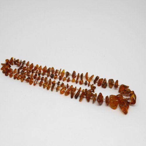alt=\"Collar largo de cordon con piedras de ambar. www.santelmotienda.com\"